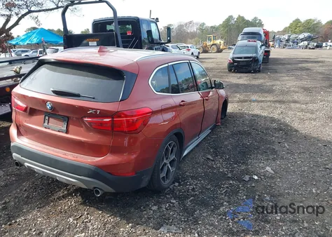 2018 BMW X1 xDrive28I z USA, uszkodzony, nr VIN WBXHT3C37J5K21409